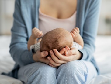 Mom holding newborn