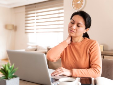 Peruvian woman is using, laptop and working from home during Covid-19