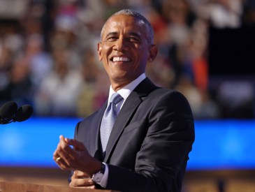 Former US President Barack Obama smiles as he speaks on the second day of the Democratic National Convention (DNC) at the United Center in Chicago, Illinois, on August 20, 2024. Vice President Kamala Harris will formally accept the party’s nomination for president at the DNC which runs from August 19-22 in Chicago. (Photo by CHARLY TRIBALLEAU / AFP)