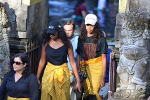 BALI, INDONESIA - JUNE 27 : Sasha (centre L) and Malia (centre R), daughters of former US President Barack Obama, visit Tirtha Empul temple at Tampaksiring Village in Gianyar on the Indonesian resort island of Bali on June 27, 2017. Barack Obama kicked off a 10-day family holiday in Indonesia that will take in Bali and Jakarta, the city where he spent part of his childhood, officials said on June 24.