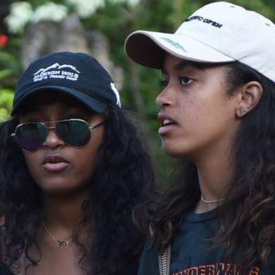 Sasha (L) and Malia (R), daughters of former US president Barack Obama, visit Tirtha Empul temple at Tampaksiring Village in Gianyar on the Indonesian resort island of Bali on June 27, 2017. Barack Obama kicked off a 10-day family holiday in Indonesia that will take in Bali and Jakarta, the city where he spent part of his childhood, officials said on June 24.