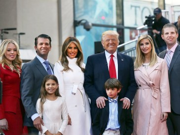 Republican presidential candidate Donald Trump stands with his wife Melania Trump (center left) and from right: son Eric Trump with his wife Lara Yunaska;  Vanessa Haydon and her husband Donald Trump Jr. In the front row are Kai Trump and Donald Trump III, children of Donald Trump Jr. on April 21, 2016 in New York City. The family appeaed at an NBC Town Hall at the Today Show.   (Photo by Spencer Platt/Getty Images)