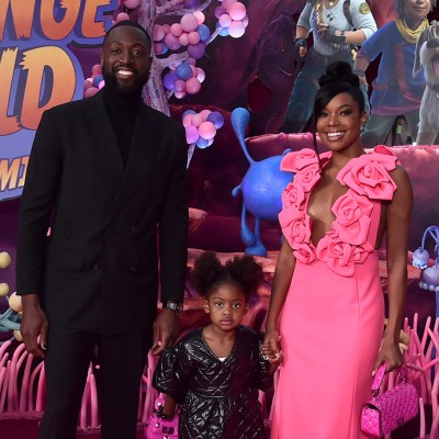 LOS ANGELES, CALIFORNIA - NOVEMBER 15: (L-R) Dwyane Wade, Kaavia James Union Wade, and Gabrielle Union attend the world premiere of Walt Disney Animation Studios' Strange World at El Capitan Theatre in Hollywood, California on November 15, 2022.
