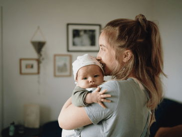 Woman holding her baby